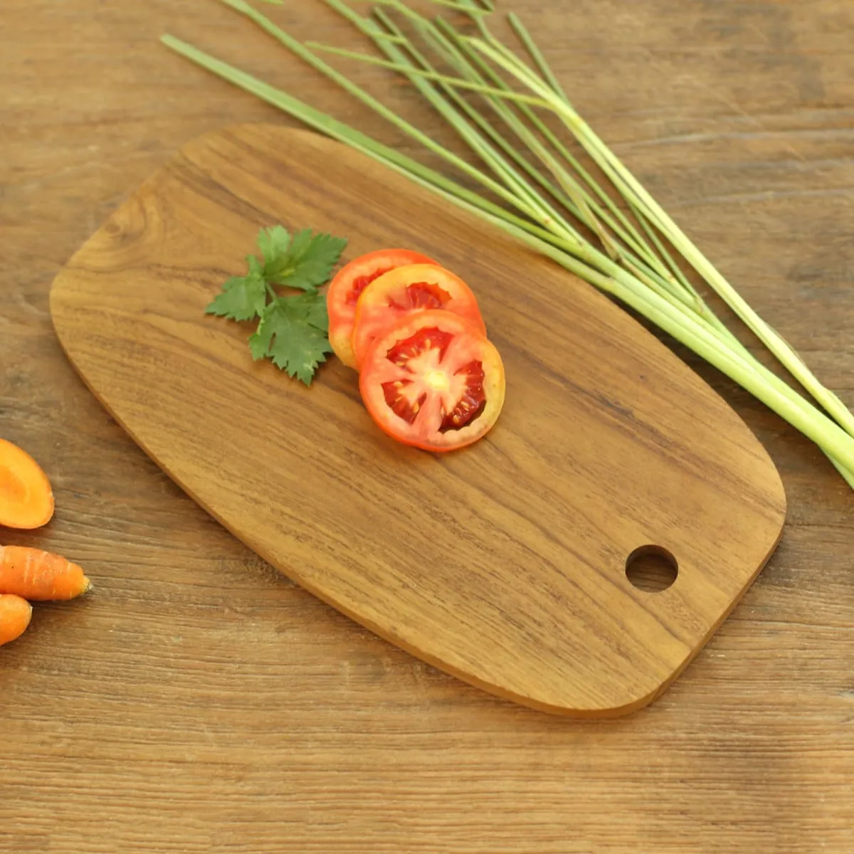 Novica Classic Oval Teak Wood Cutting Board